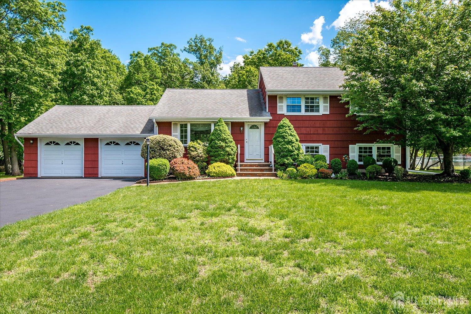 This is it! Welcome home to this solidly built 3&#8209;bedroom, 1.5&#8209;bath split&#8209;level set on almost a full acre at the very end of a quiet street in Piscataway. Inside, the light&#8209;filled main level offers a spacious living room that flows to the dining area and an eat&#8209;in kitchen ready for your personal updates. All 3 bedrooms are grouped together upstairs with a shared full bath and your very own owners suite has an attached private half-bath. On the lowest level, a large family room ideal for movie nights and a separate office provides a convenient work&#8209;from&#8209;home setup. A walk-out laundry/utility area leads to the backyard. Key updates include vinyl replacement windows and a newer HVAC and hot water heater, giving you a head start on modernization while you customize finishes to your taste. The newly paved driveway leads to an attached 2-car garage perfect for projects and storage. This park-like lot is cleared for play, gardening, or future expansion, while mature woods along two sides create a natural privacy screen rarely found this close to shops, schools, and major commuting routes. With generous square footage, abundant outdoor space, and a sought&#8209;after location on a dead&#8209;end street, this property offers lasting value and exceptional potential.