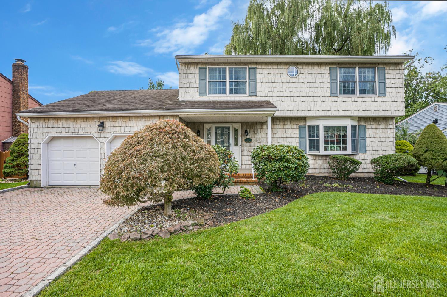 Single family home for sale at 11 Woodrow Wilson Dr, Edison, NJ 08820 | MLS# 2704763R