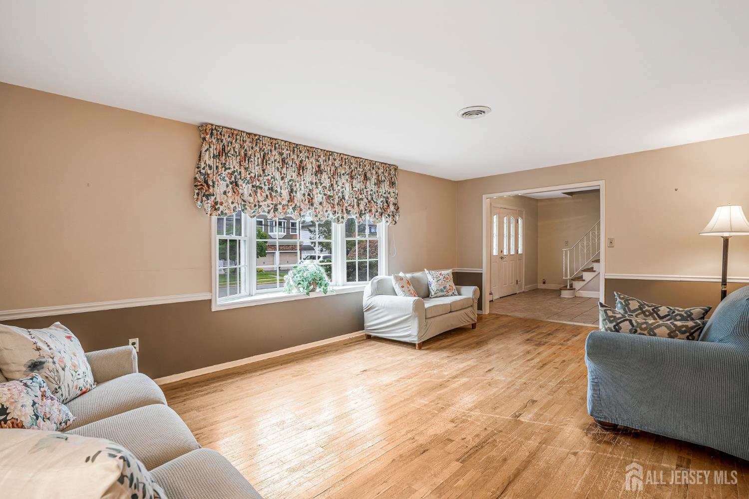 Photo 2 of Single family home for sale at 11 Woodrow Wilson Dr, Edison, NJ 08820 | MLS# 2704763R | Listing updated on 2026-09-22
