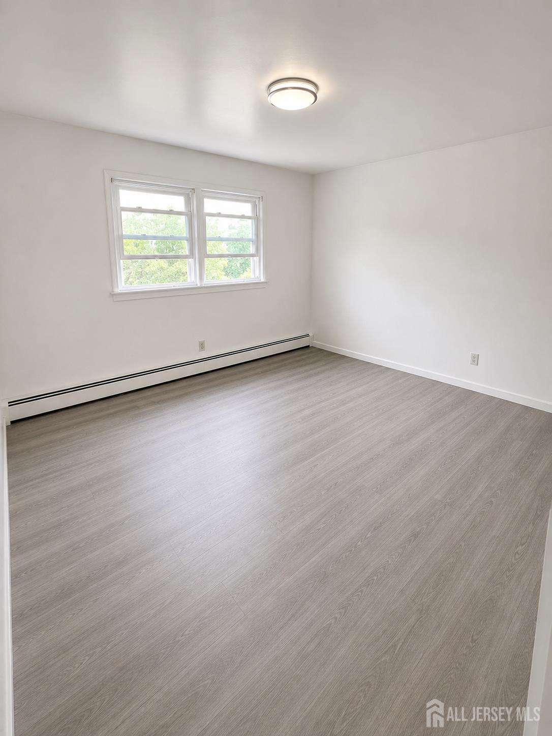 Photo 3 of Multi family home for sale at 97 99 Glenn Dr, Keasbey, NJ 08832 | MLS# 2705455R | Listing updated on 2026-10-05