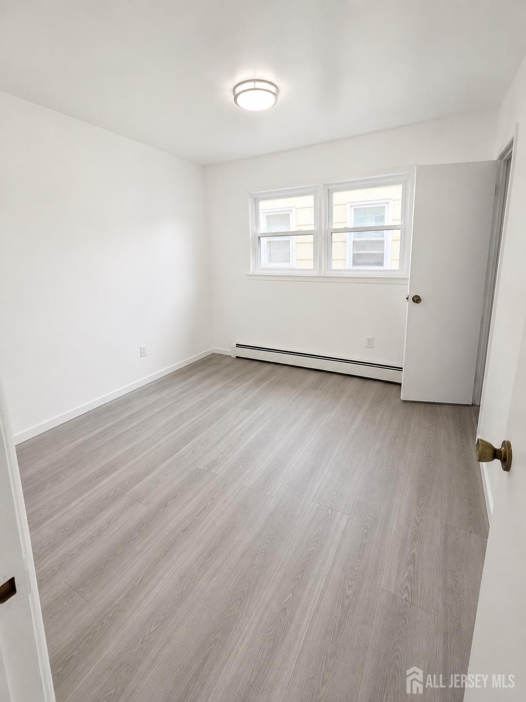 Photo 3 of House for sale at 97-99 Glenn Dr, Keasbey, NJ 08832 | MLS# 2705455R | Listing updated on 2026-10-05