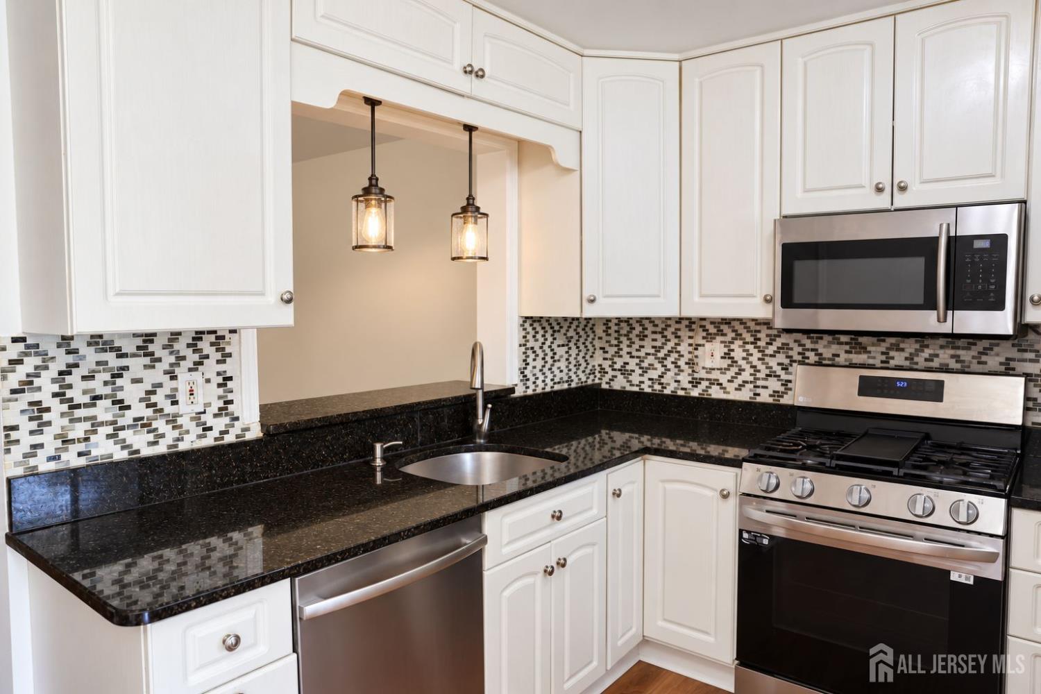 Photo 3 of Townhouse for sale at 2 Tulip Ct, Edison, NJ 08820 | MLS# 2705559R | Listing updated on 2026-10-01