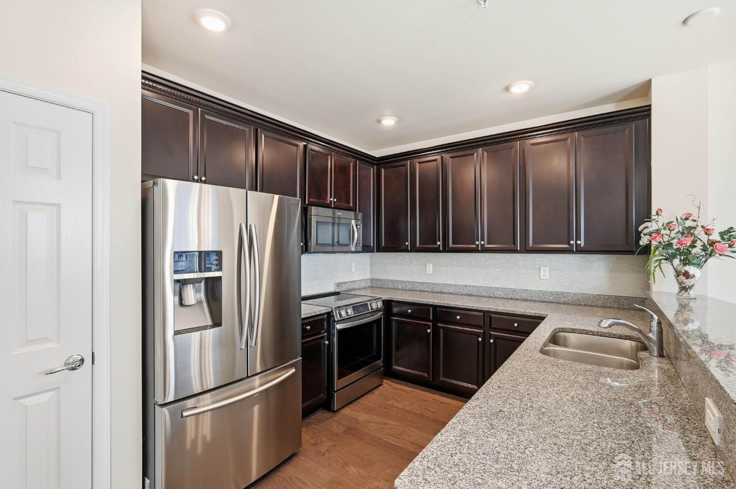Photo 1 of Townhouse for sale at 1424 Hudson Cir, Highland Park, NJ 08904 | MLS# 2705624R | Listing updated on 2026-10-08