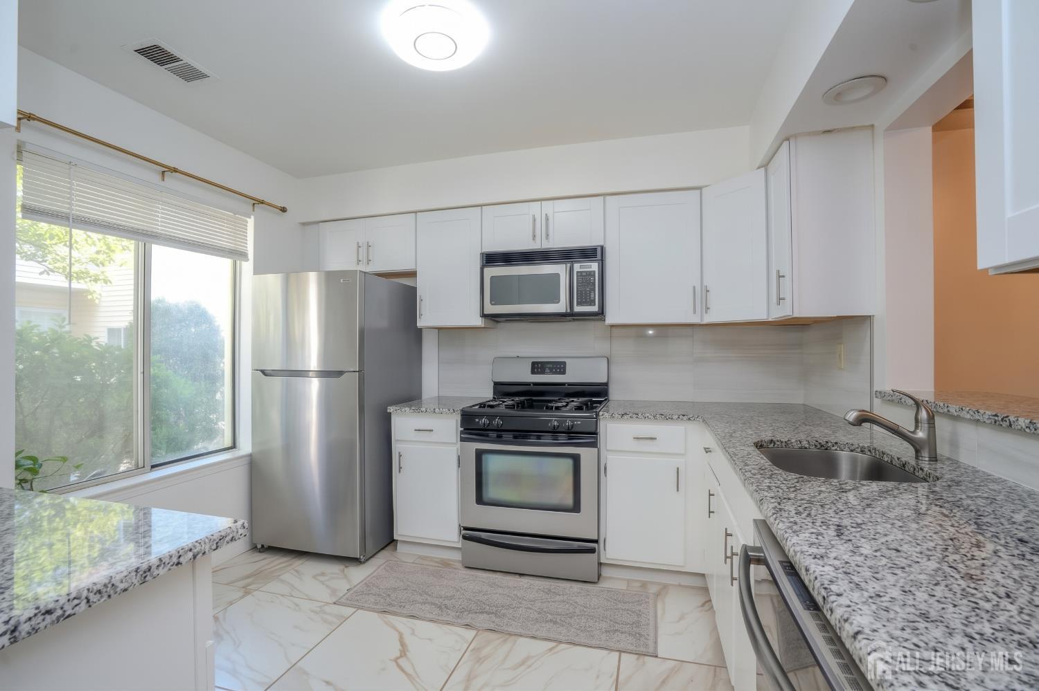 Photo 4 of Townhouse for sale at 1088 Schmidt Ln, North Brunswick, NJ 08902 | MLS# 2705677R | Listing updated on 2026-10-06