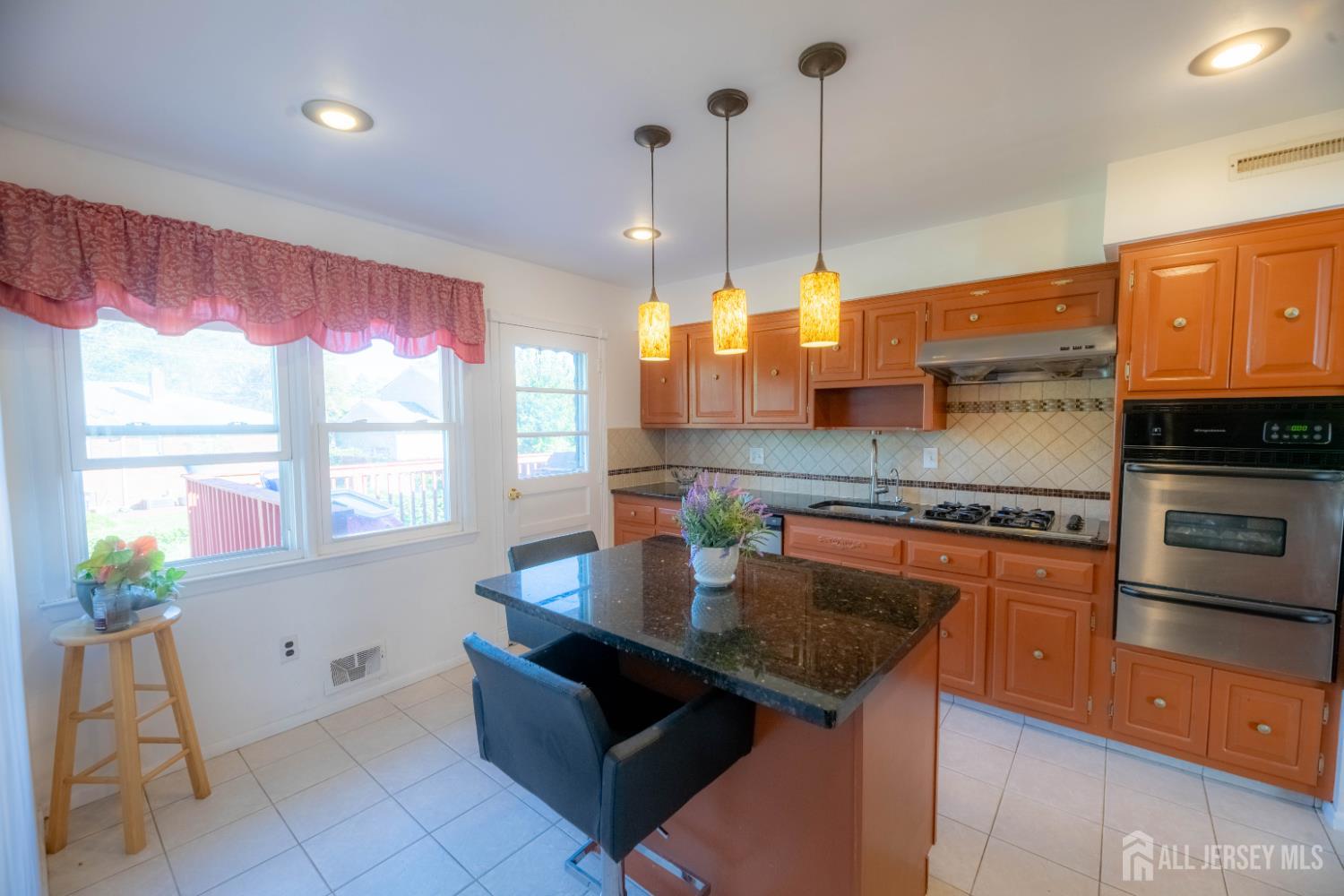 Photo 4 of Single family home for sale at 4 Charles Ct, Edison, NJ 08820 | MLS# 2705755R | Listing updated on 2026-10-07