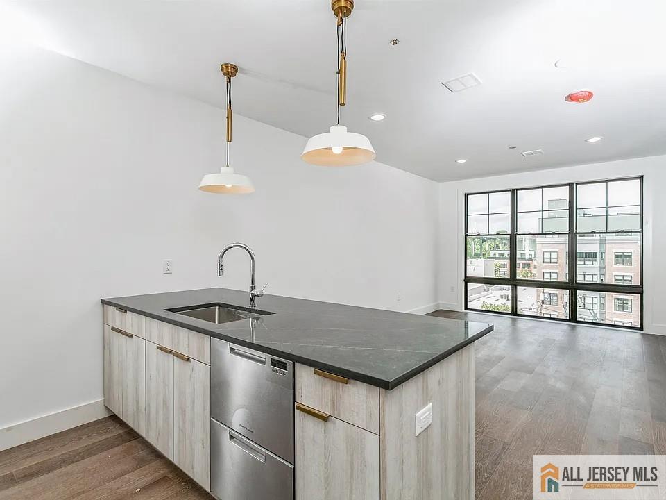 Photo 2 of Condo for sale at 386 5th Street #301, Jersey City, NJ 07302 | MLS# 2770695M | Listing updated on 2026-10-09